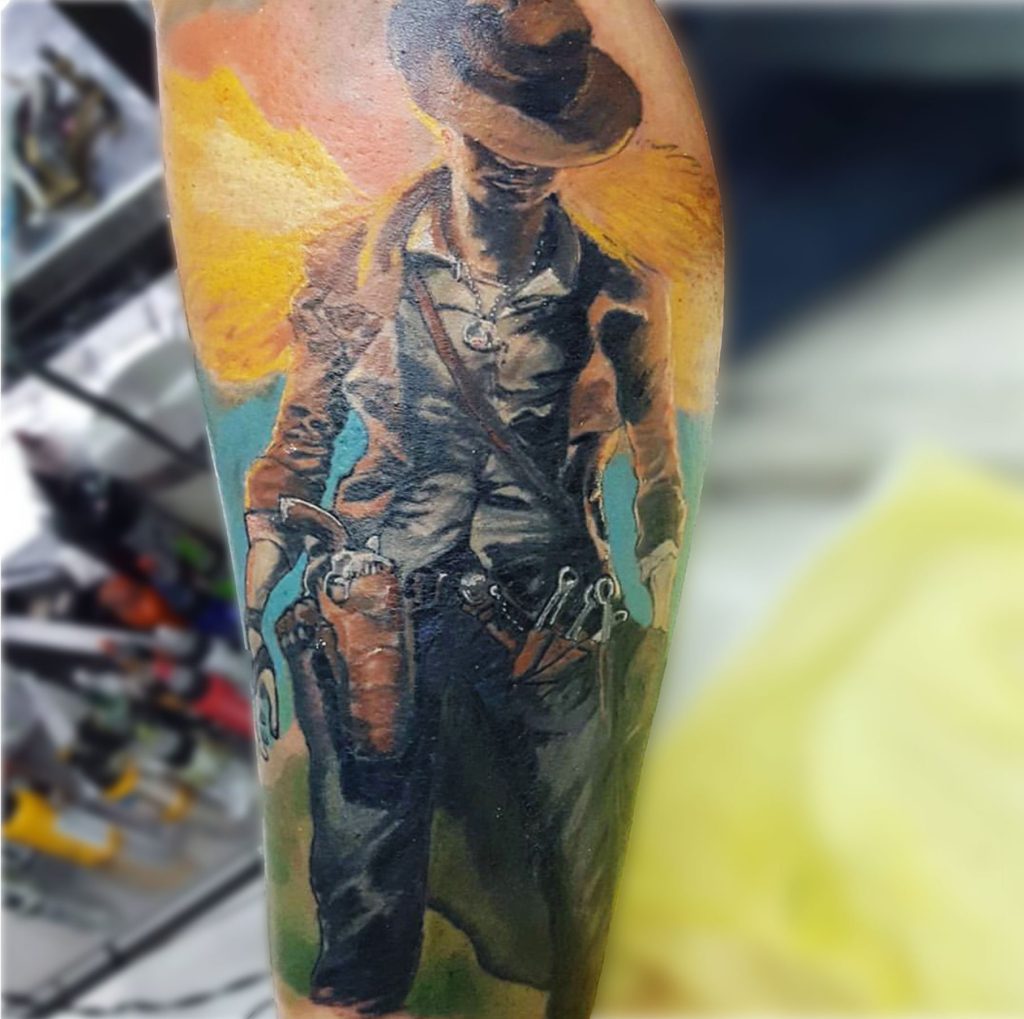 tatuaje realista de vaquere